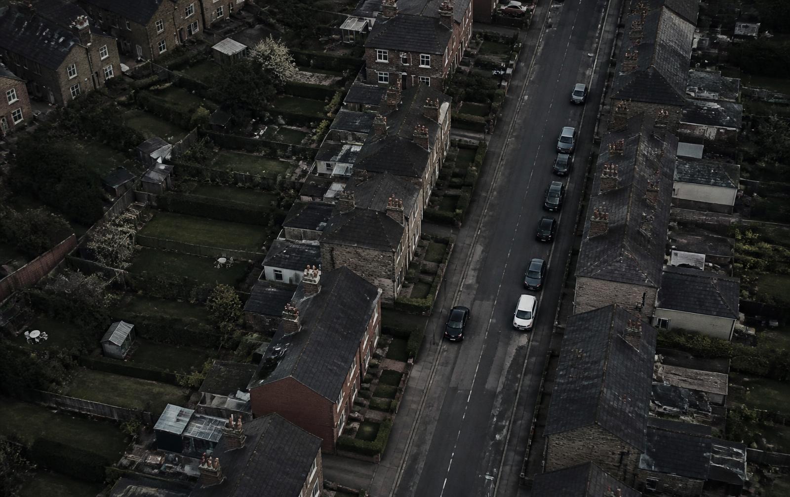 Aerial view of a Derbyshire residential street with gardens and driveways
